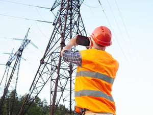 Electrical-engineer-working.-Talking-on-the-phone-and-working-on-541608210_3000x2250-scaled-e1633384120455-Jan-04-2024-07-52-39-1205-AM